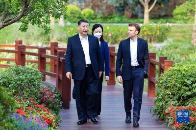 习近平同法国总统马克龙在广州非正式会晤 