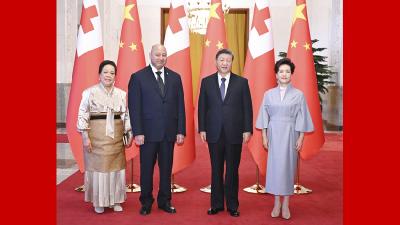 习近平会见汤加国王图普六世
