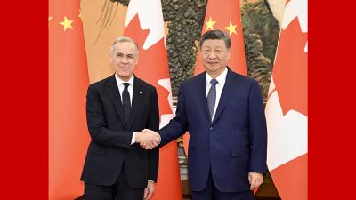 习近平会见加拿大总理卡尼