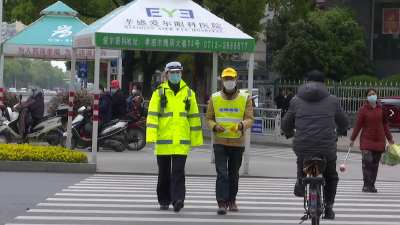 “满分”驾驶者“变身”交通志愿者