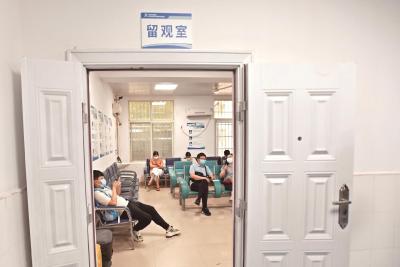 记者兵分多路探访新冠疫苗接种点:市民积极预约 现场排队有序