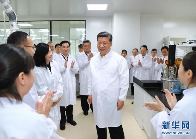习近平：高举新时代改革开放旗帜 把改革开放不断推向深入