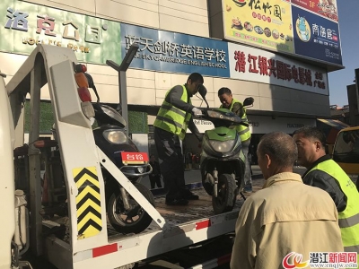 潜江重拳整治园林北路“乱停车”