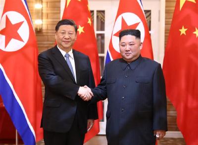 习近平同朝鲜最高领导人金正恩就中朝建交70周年互致贺电