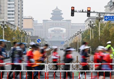 奔跑，绘就城市靓丽的风景——从北京马拉松看全民健身热潮