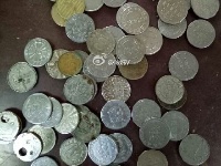 无人售票假币多引热议 乘车投假币拷问公众良心