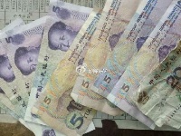 无人售票假币多引热议 乘车投假币拷问公众良心