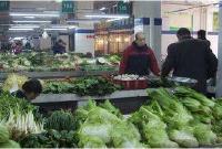 菜摊档主因一把白菜打伤顾客 赔偿对方11万