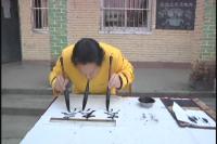 蒋先稳：三笔同书显绝技 心系公益乐助残