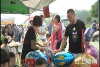 特别的六一节：孩子们摆摊义卖 奉献爱心