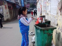 聚奎门学校开展“关爱他人，关爱社会，关爱自然”主题学雷锋活动