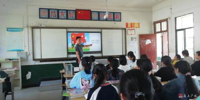杨寨镇中心中学开展国防教育宣传活动