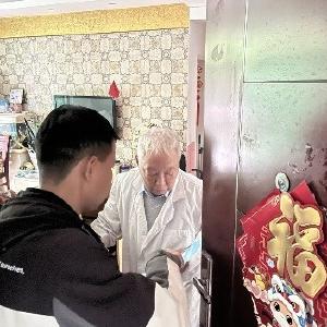 敲门入户送保障，医保宣传暖人心