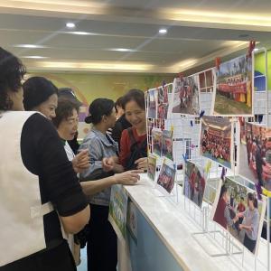 老照片唤醒记忆，巧手艺凝聚人心——将花社区举办“红色初心・共治体验日”游园会