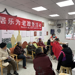 吴家山街南山社区开展公益理发活动