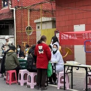 将花社区联合举办“武汉以我为荣 弘扬雷锋精神 传递志愿力量”活动