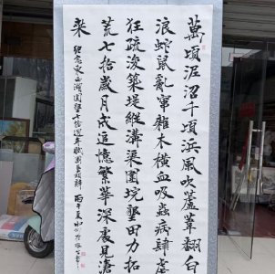 笔墨寄围垦情怀！园林社区崔根生捐书法藏品入藏区档案馆