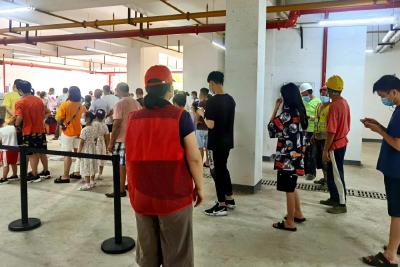 疫情防控争分夺秒 蔡甸下沉党员化身“志愿红”