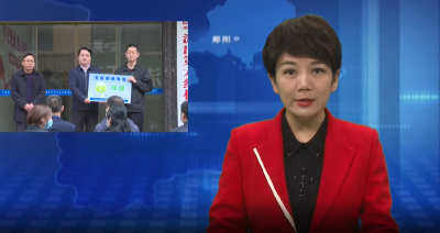 李海伦为郧阳区卫健局无疫创建授“绿牌”