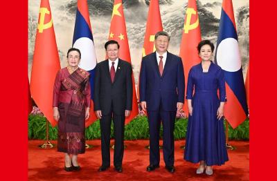习近平同老挝人民革命党中央总书记、国家主席通伦举行会谈