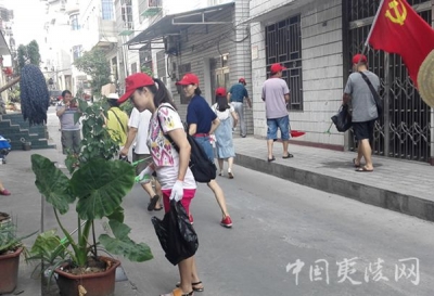 【区广播电视台】飘扬在社区巷道中的党旗——夷陵区广播电视台开展社区文明创建为党庆生