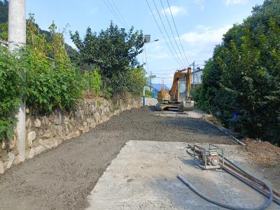 安置点道路蝶变 村民出行乐享“坦途”