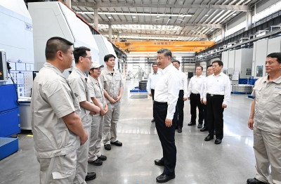 时政微观察丨集中力量办好自己的事