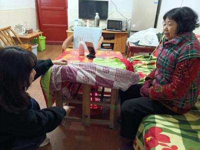 以爱增温暖寒冬 社区走访护老安
