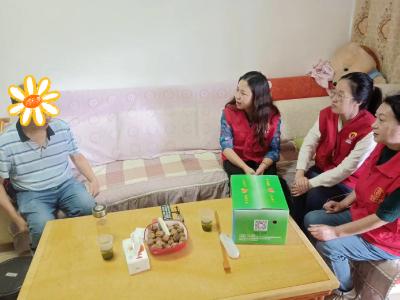 朝阳社区：橙心送暖进家门 社区护航见真情