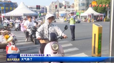 襄州交警：无惧“烤”验 “汗”为平安