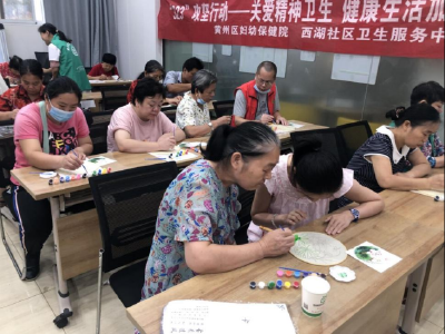 惠民社区开展助残康复训练古风手工团扇活动