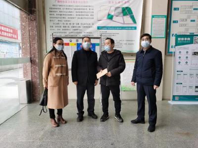 市一医院春节走访慰问援外医疗队员家属