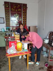杨店镇双节前走访慰问特扶家庭