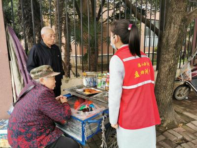 盘泗洲社区开展校园周边环境治理工作