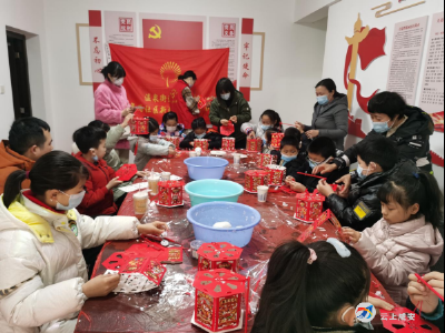万年路社区开展“巧手做花灯 欢乐闹元宵”活动