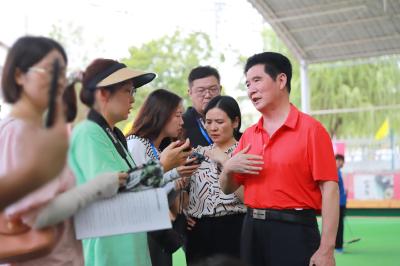 基层人物丨​张以易：引领咸安门球运动走向辉煌的领航人！  