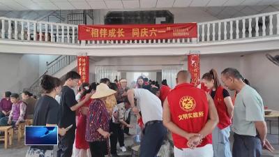 我们的节日·端午节  |  金海管理区:包粽子唠家常  热热闹闹庆端午