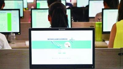 一周如何阅完6.2万余名考生试卷 走进中考评卷现场