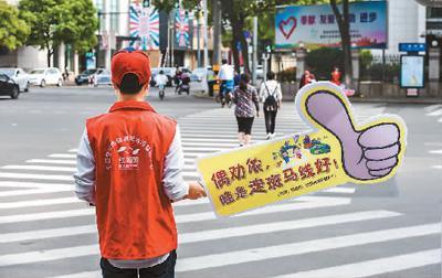 “中国式过马路”死结怎么解 曝光治理惹争议