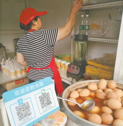 中国移动支付引领世界 体验:一个月没摸过钱