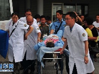 首批老挝车祸受伤中国游客回国