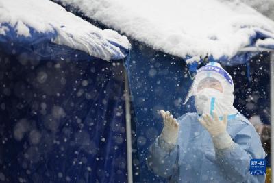北京：风雪中的坚守