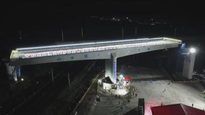 聚力建支点 一线直击｜ 合武高铁曹家坳特大桥成功转体 跨京九铁路实现毫米级对接