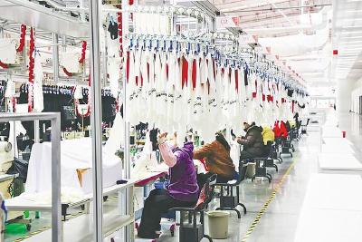 掇刀智能制衣工厂上线 员工每天少走一万多步