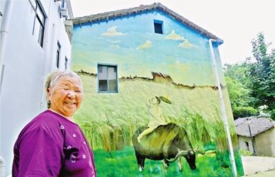 农民画师妙手描绘武汉新农村：他把乡愁画墙上