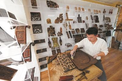 非遗传承人一刀一刻显匠心 雕出花如锦 糕点更添香